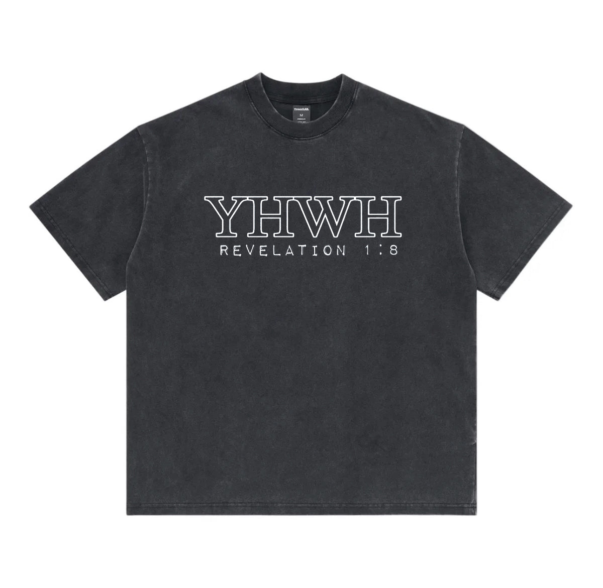 A washed black short-sleeve t-shirt with 'YHWH REVELATION 1:8' printed in white outline text across the chest, displayed flat against a solid white background.